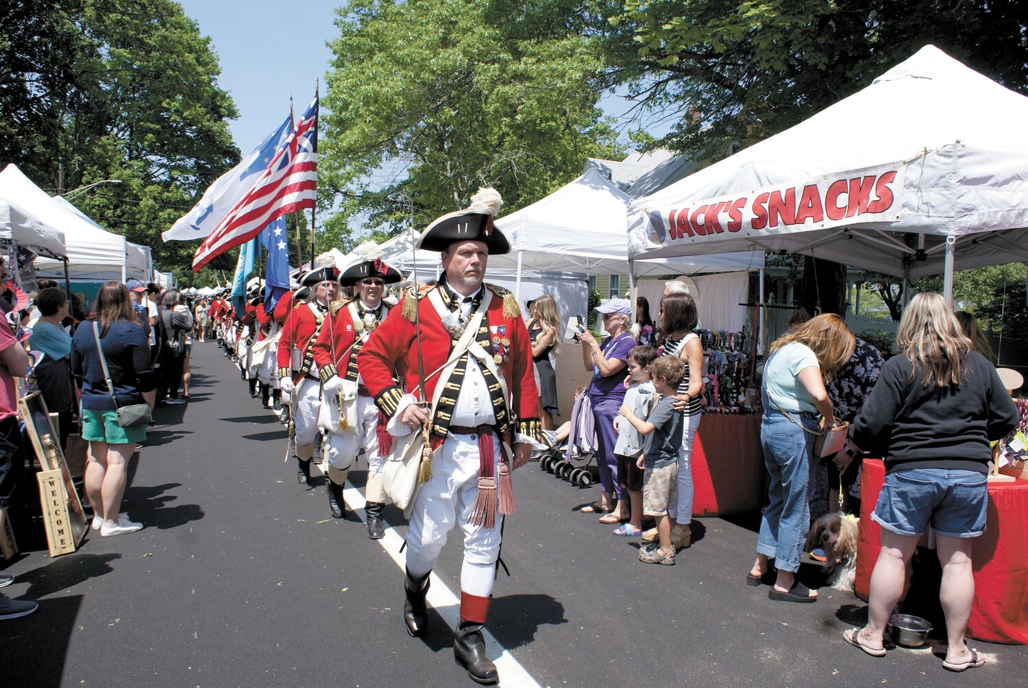 MARCHING STRONG: The Pawtuxet Rangers, one of the oldest chartered military militias in the country, march to celebrate the Gaspee Days festival. With the celebration going on all the way through June 11, those attending can still look forward to a host of wonderful attractions. June 3 will bring the Warwick Symphony Orchestra to Pawtuxet Park at 5:30 p.m. to entertain crowds with music and then fireworks will light up Salter’s Grove, Warwick, starting at 9:30 p.m. The final weekend of Gaspee takes place over Saturday June 10 and Sunday June 11. Events will include Ecumenical Services from Trinity Episcopal Church and a Gaspee Days 5K race on Saturday before the annual Gaspee Days Parade, which begins at 10 a.m. and travels the lenght of Narragansett Parway in Warwick. Sunday will bring the Blessing of the Fleet at Rhode Island Yacht Club  at 11 a.m., several events in Pawtuxet park, such as Sunday in the Park with live music and food at noon, a raffle drawing at 3 p.m. and the traditional Burning of the Gaspee at 4 p.m.   (Photo by Steve Popiel)